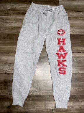 NBA Gray Sweatpants with Pockets. Red Hawks Lettering